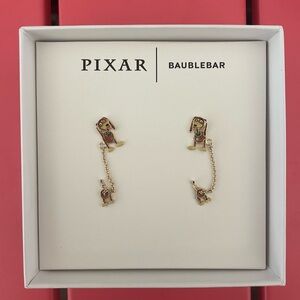 Disney Slinky Dog double earrings.